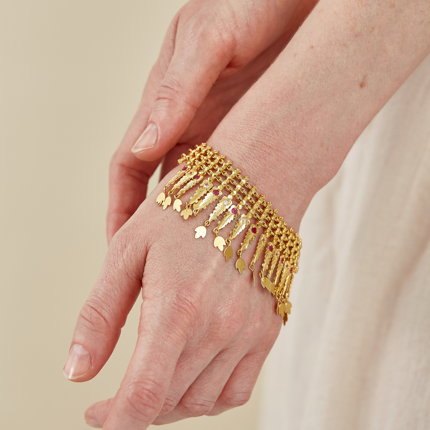 22 Kt Gold Fringe Bracelet with Ruby Accents & 18 Kt gold clasp