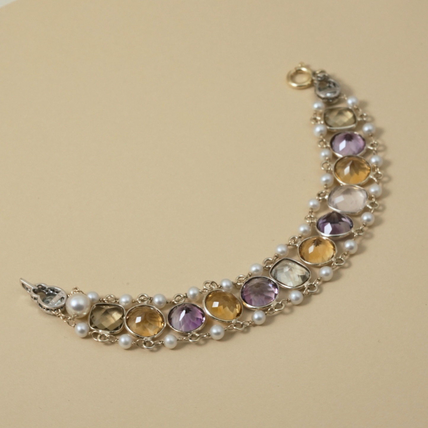 9 Kt & Sterling Silver "Harvest Light" Gemstone & Pearl Bracelet that evokes abundance and warm, glowing tones; earthy but refined.