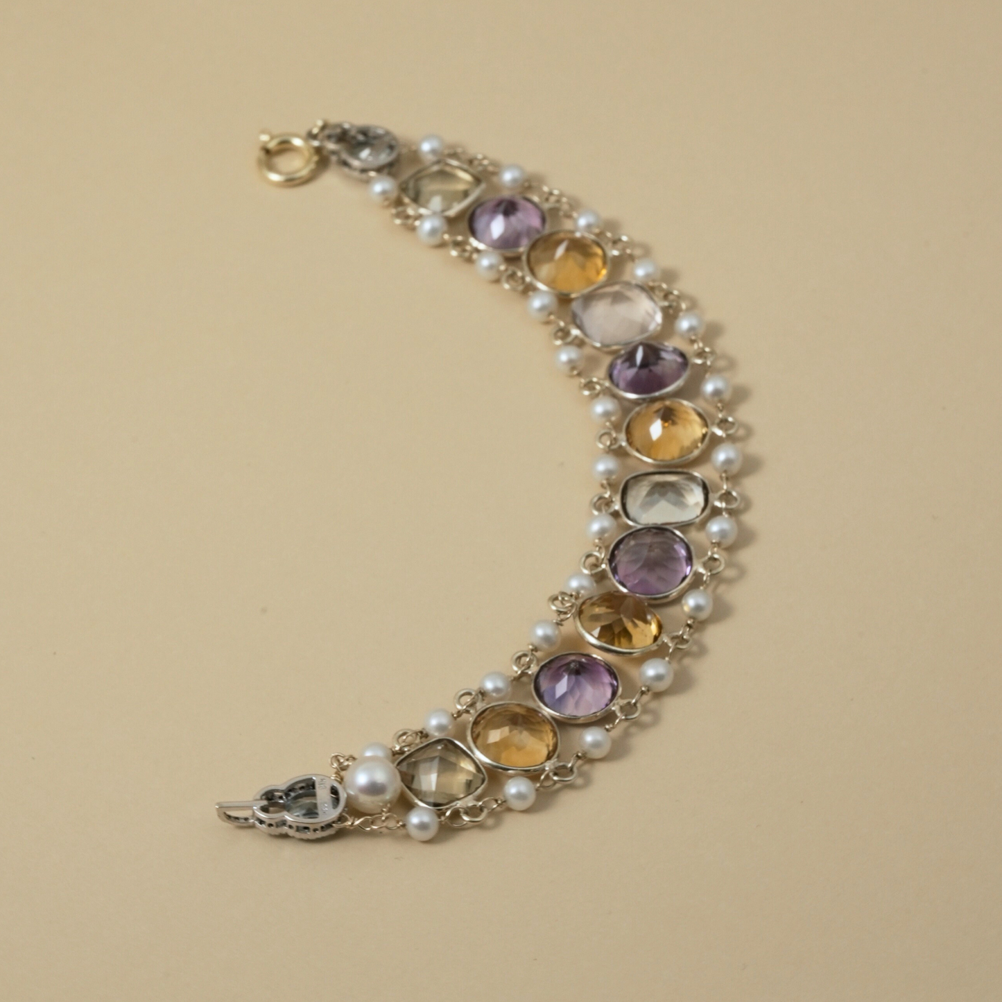 9 Kt & Sterling Silver "Harvest Light" Gemstone & Pearl Bracelet that evokes abundance and warm, glowing tones; earthy but refined.
