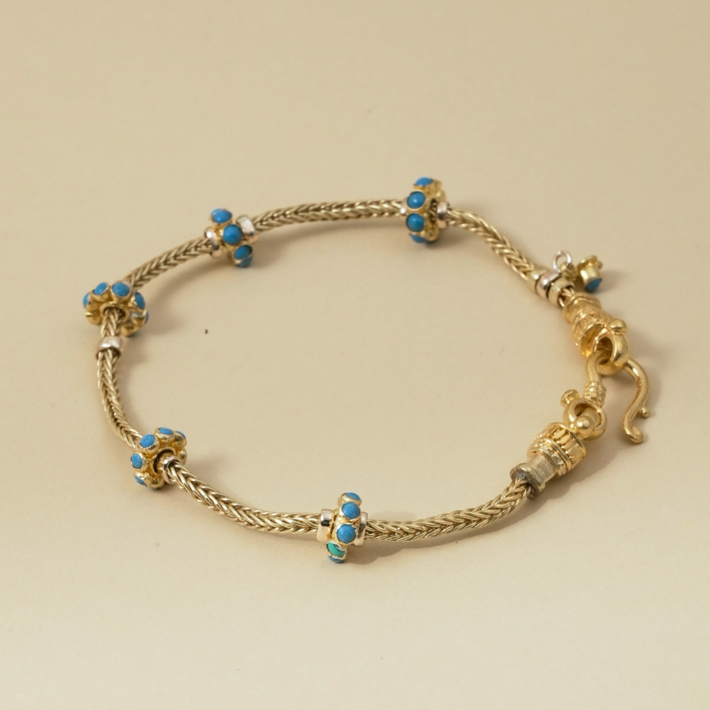 Gold Bracelet with five Turquoise Enamel Accents in a Byzantine-Inspired Design