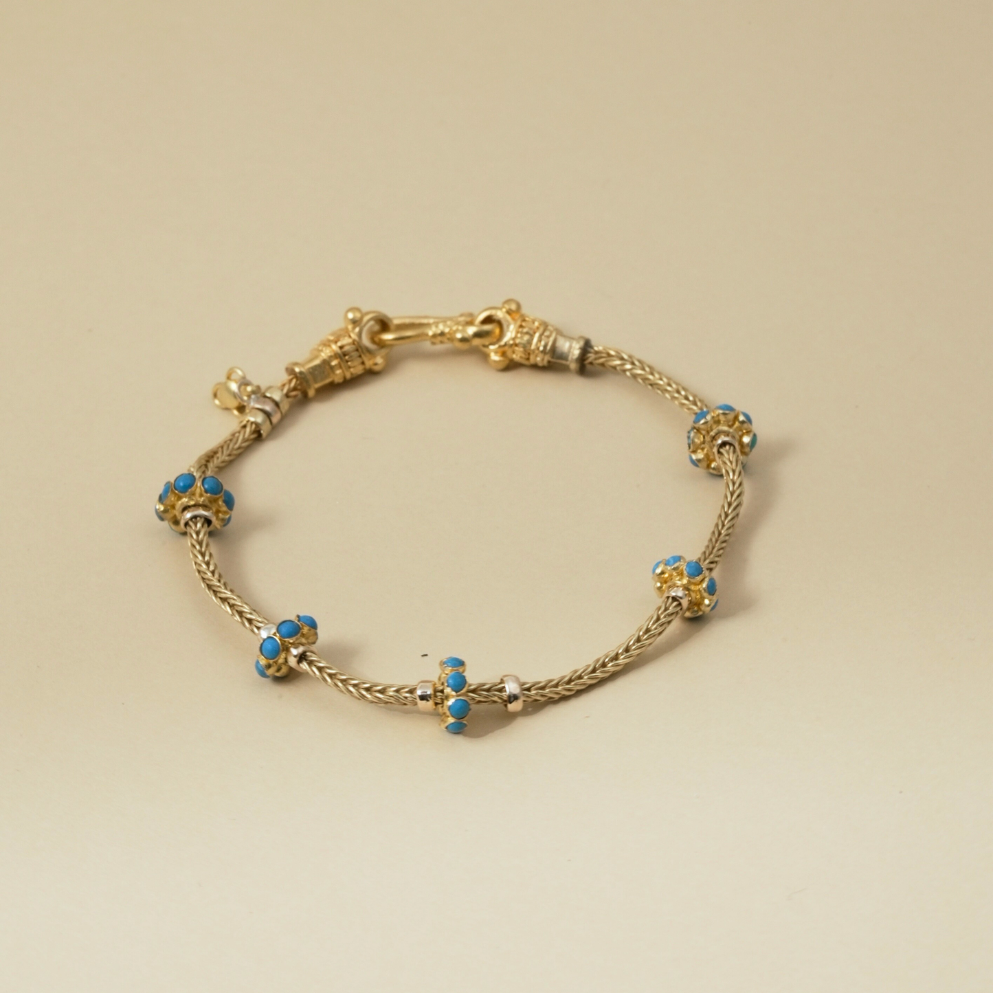 Gold Bracelet with five Turquoise Enamel Accents in a Byzantine-Inspired Design