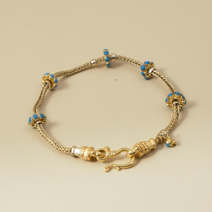 Gold Bracelet with five Turquoise Enamel Accents in a Byzantine-Inspired Design