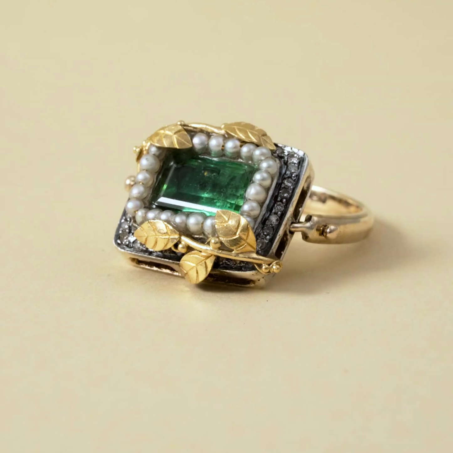18 Kt Gold leaves on Sterling Silver & 9 Kt Ring with a Tourmaline & Pearls