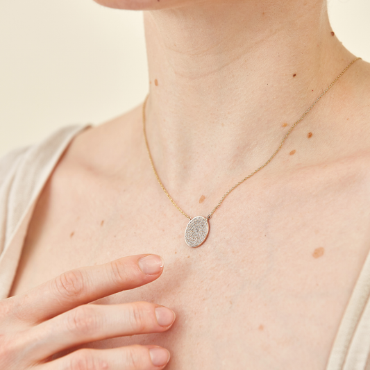 9 K Gold Necklace with Round Pendant encrusted with Pavé Set Diamonds