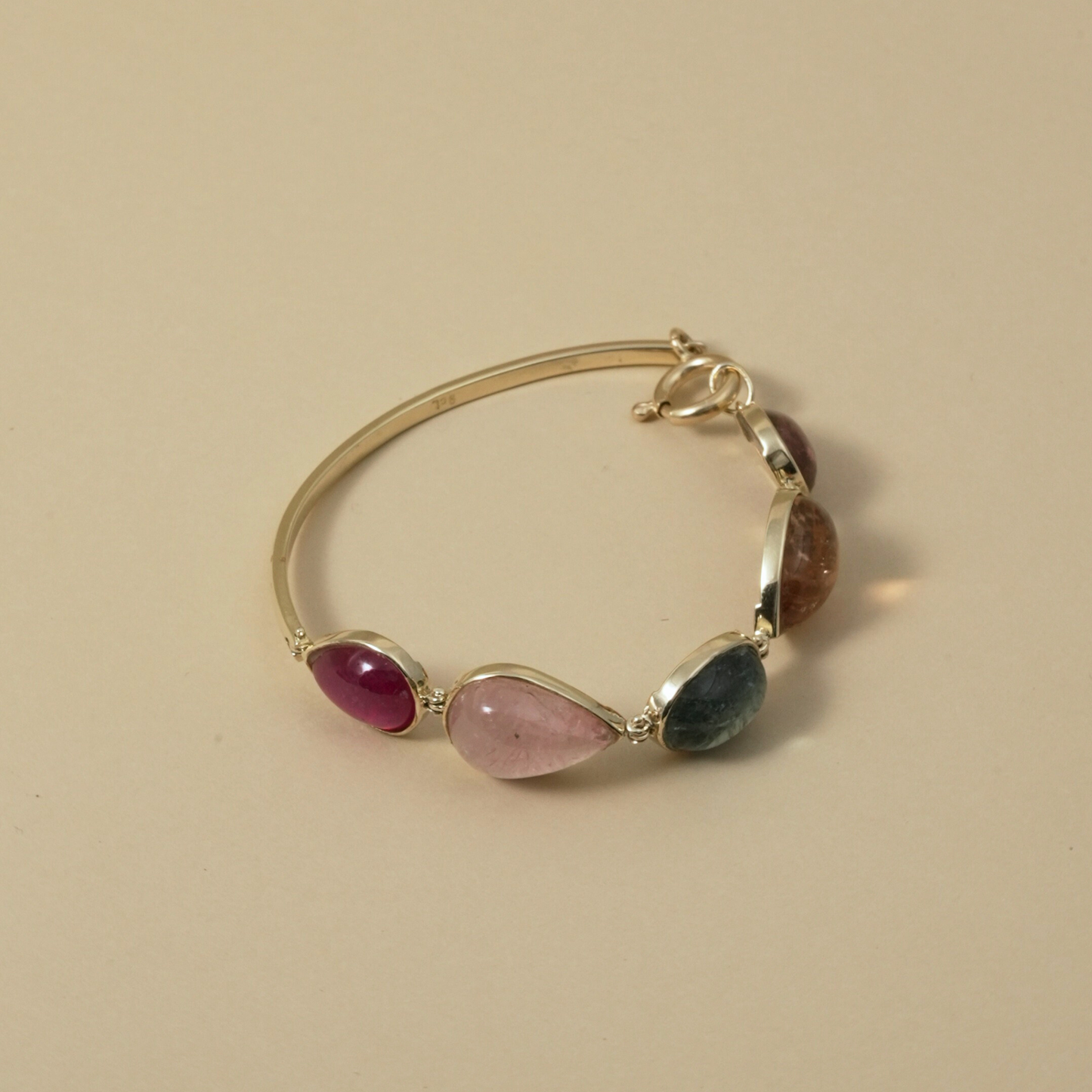 Cape Aura - The Cape’s natural splendour — from fynbos fields to the golden horizon. A multi-colour Tourmaline Cabochon Bracelet in 9 Kt Gold