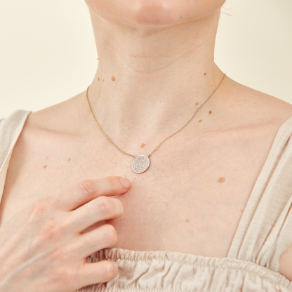 9 K Gold Necklace with Round Pendant encrusted with Pavé Set Diamonds
