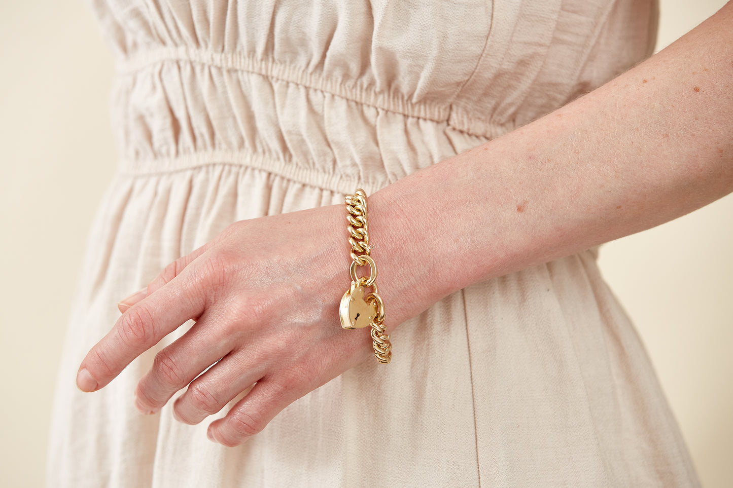 9Kt Gold Heart Padlock Curb Bracelet