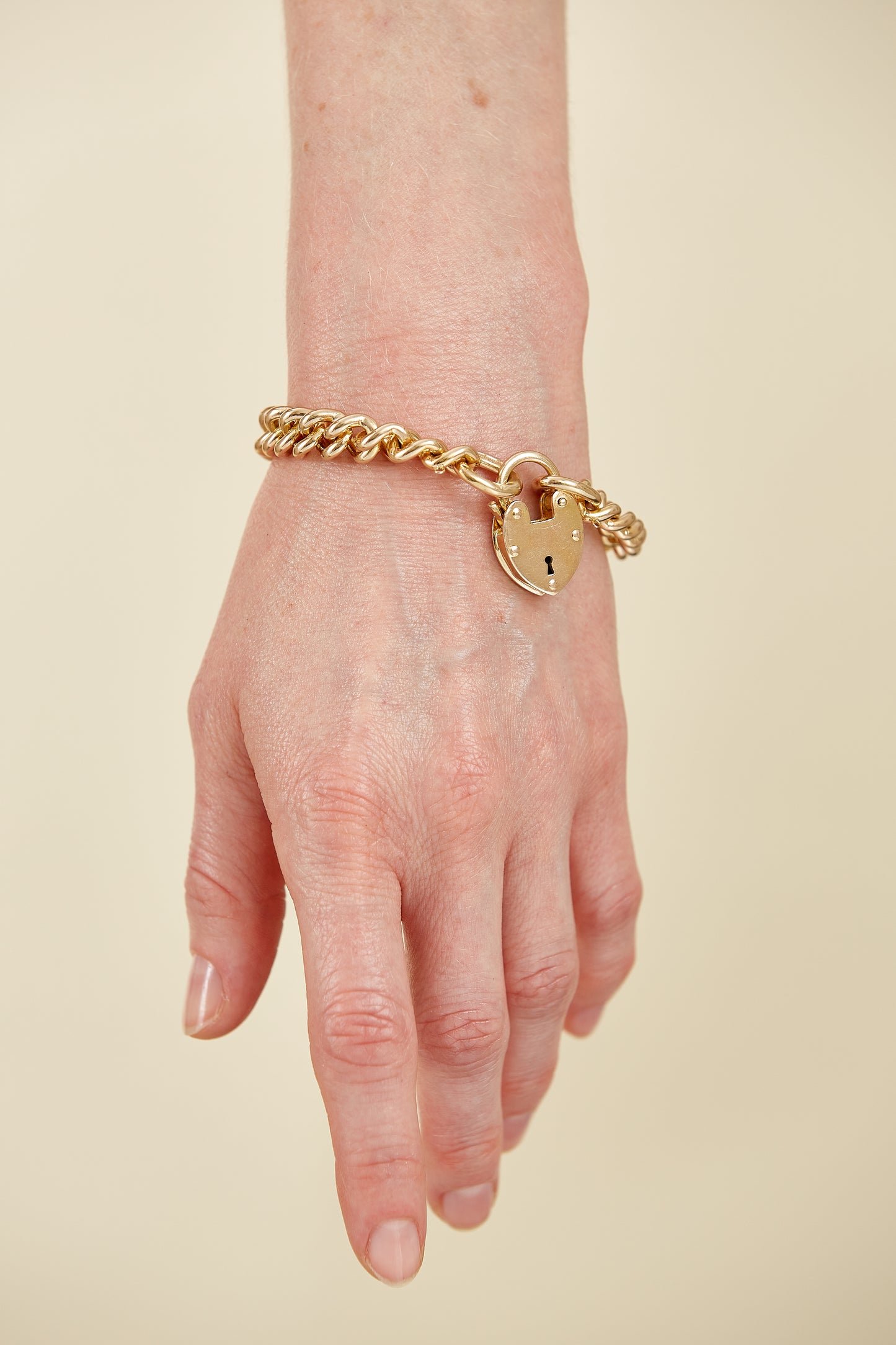 9Kt Gold Heart Padlock Curb Bracelet