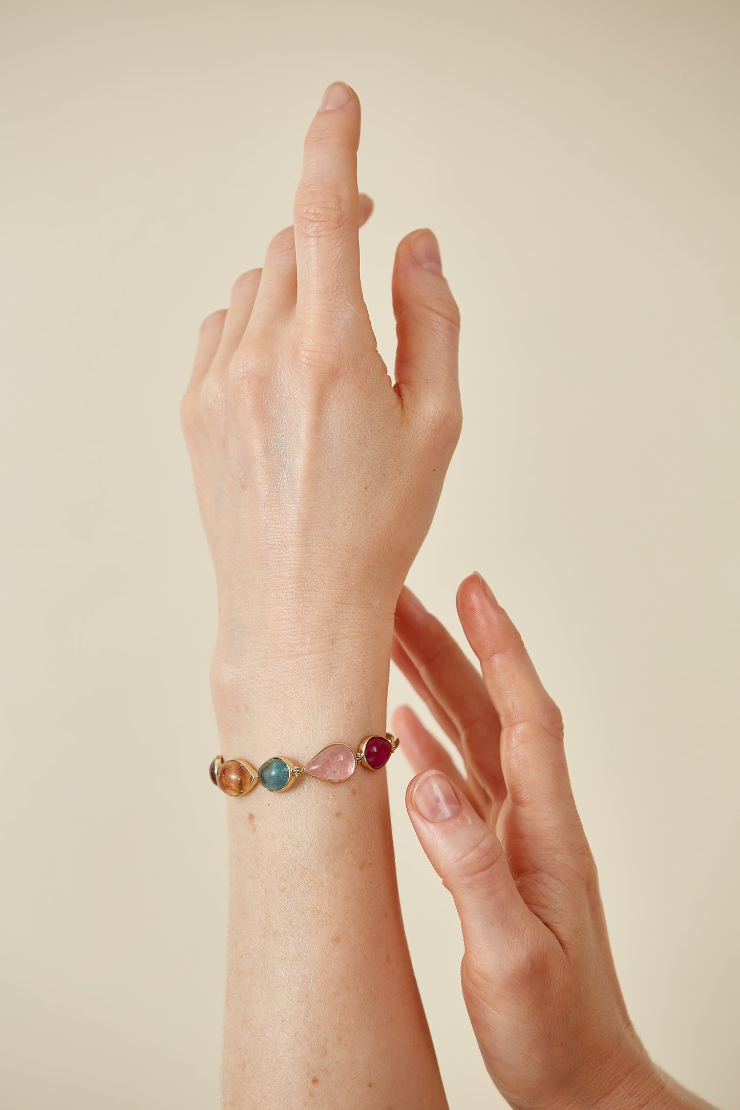 Cape Aura - The Cape’s natural splendour — from fynbos fields to the golden horizon. A multi-colour Tourmaline Cabochon Bracelet in 9 Kt Gold