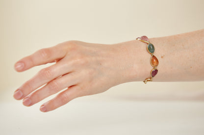 Cape Aura - The Cape’s natural splendour — from fynbos fields to the golden horizon. A multi-colour Tourmaline Cabochon Bracelet in 9 Kt Gold
