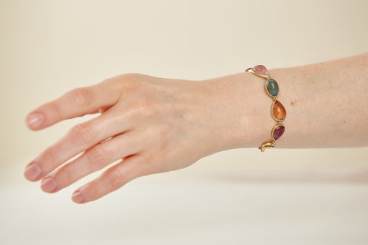 Cape Aura - The Cape’s natural splendour — from fynbos fields to the golden horizon. A multi-colour Tourmaline Cabochon Bracelet in 9 Kt Gold