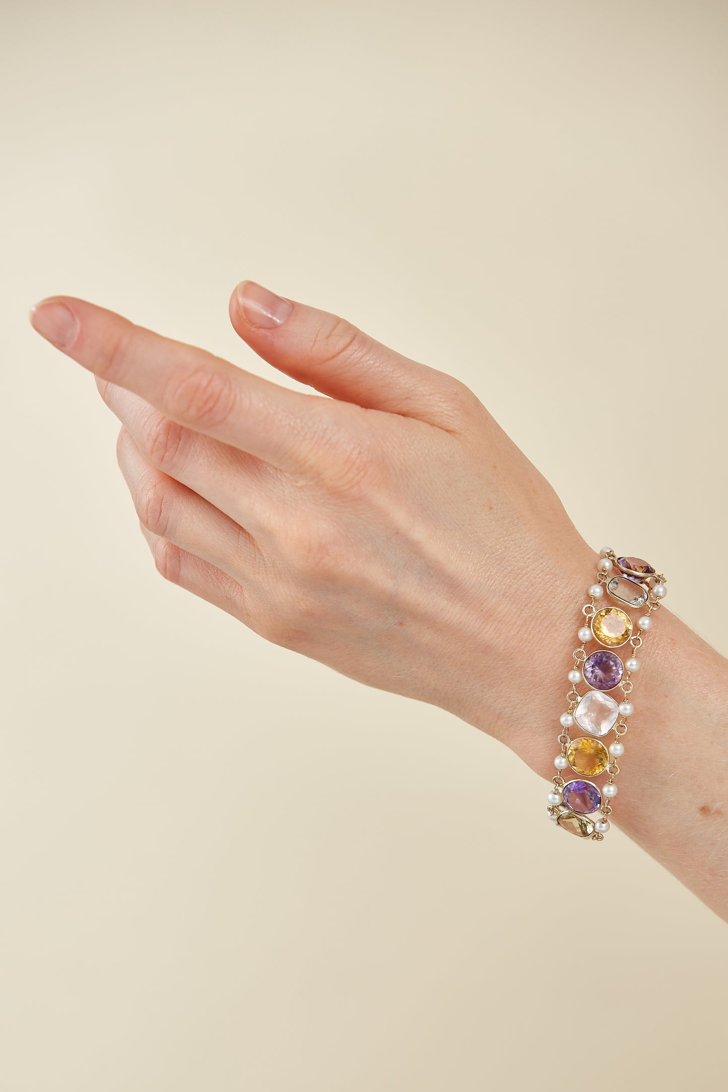 9 Kt & Sterling Silver "Harvest Light" Gemstone & Pearl Bracelet that evokes abundance and warm, glowing tones; earthy but refined.