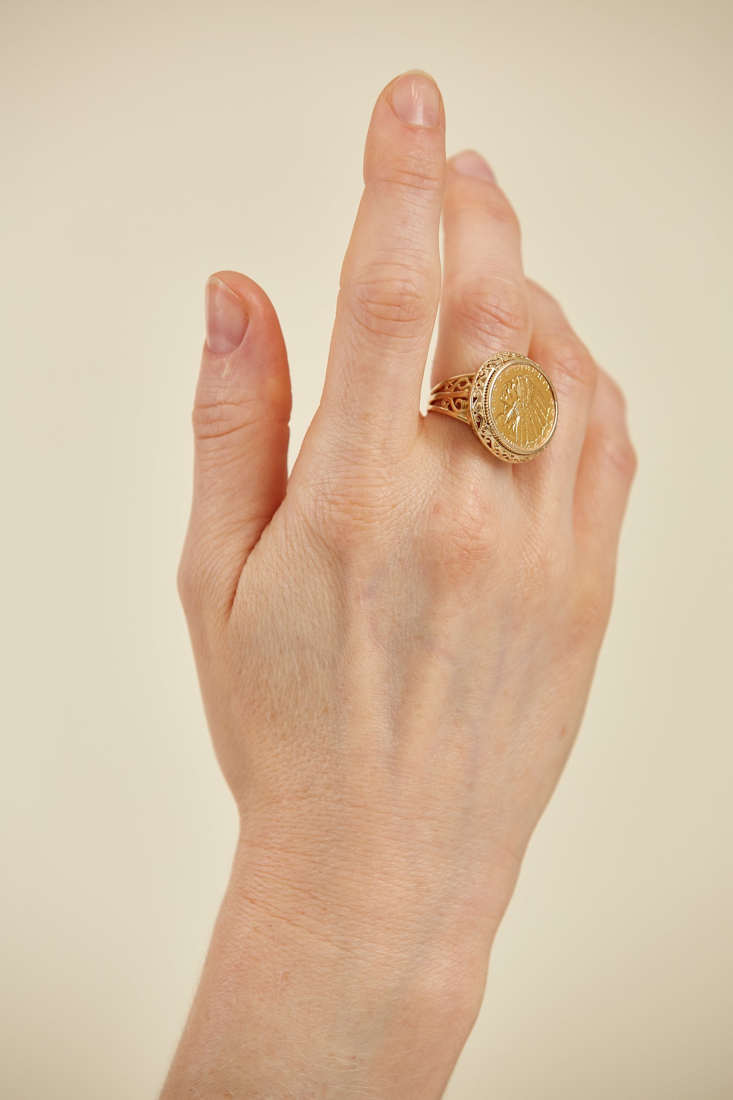 Bold 9K gold ring featuring a vintage-style coin face. A powerful unisex statement ring with heritage character and timeless appeal.
