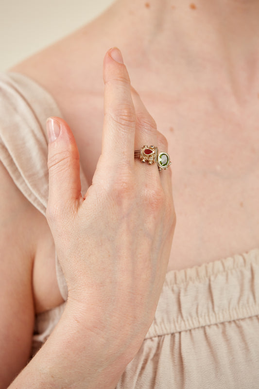 Oval Peridot with assorted assorted gemstone accents