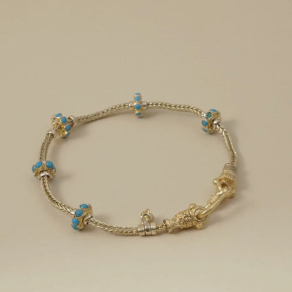 Gold Bracelet with five Turquoise Enamel Accents in a Byzantine-Inspired Design